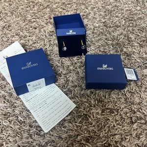 New Swarovski Lunar drop earrings
Pink, Rose gold-tone plated new